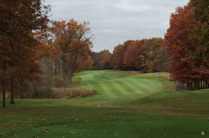 view of golf course in autumn